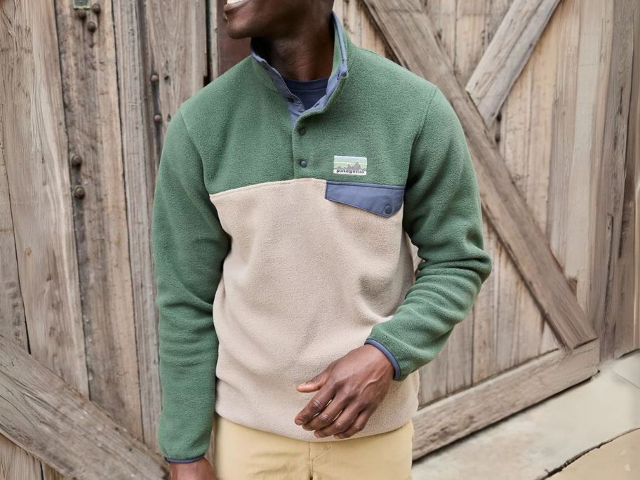 man wearing green and beige Patagonia Men's Synchilla Snap Pullover