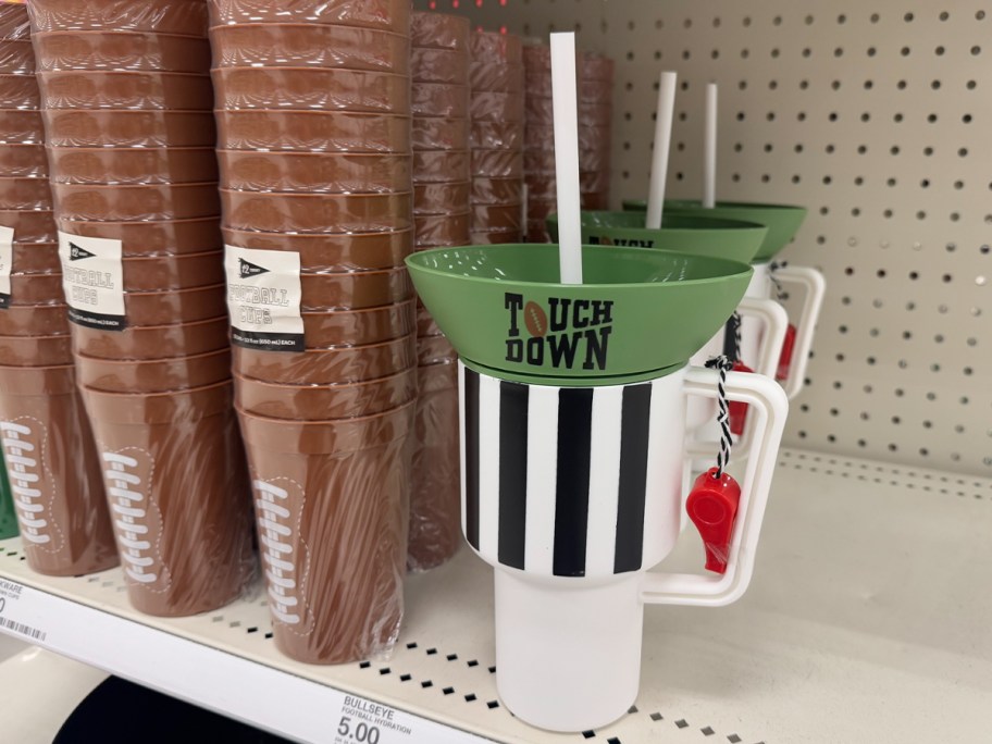 football cups on shelf