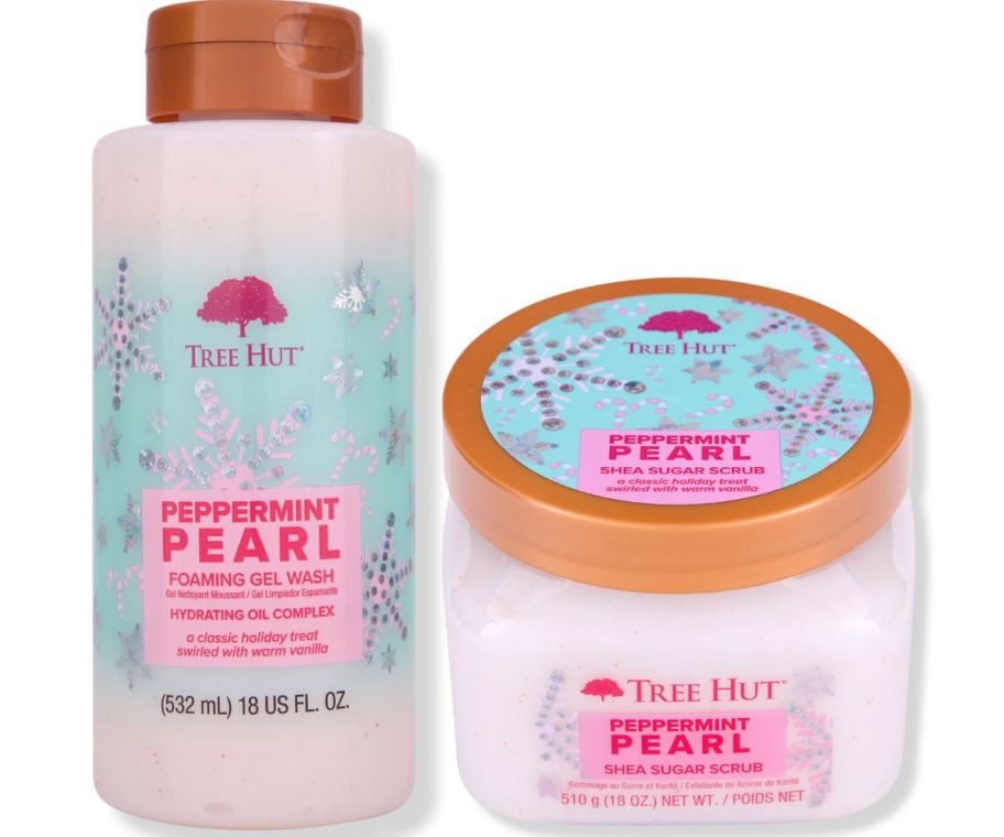 a bottle of tree hut body wash shown with a jar of sugar body scrub