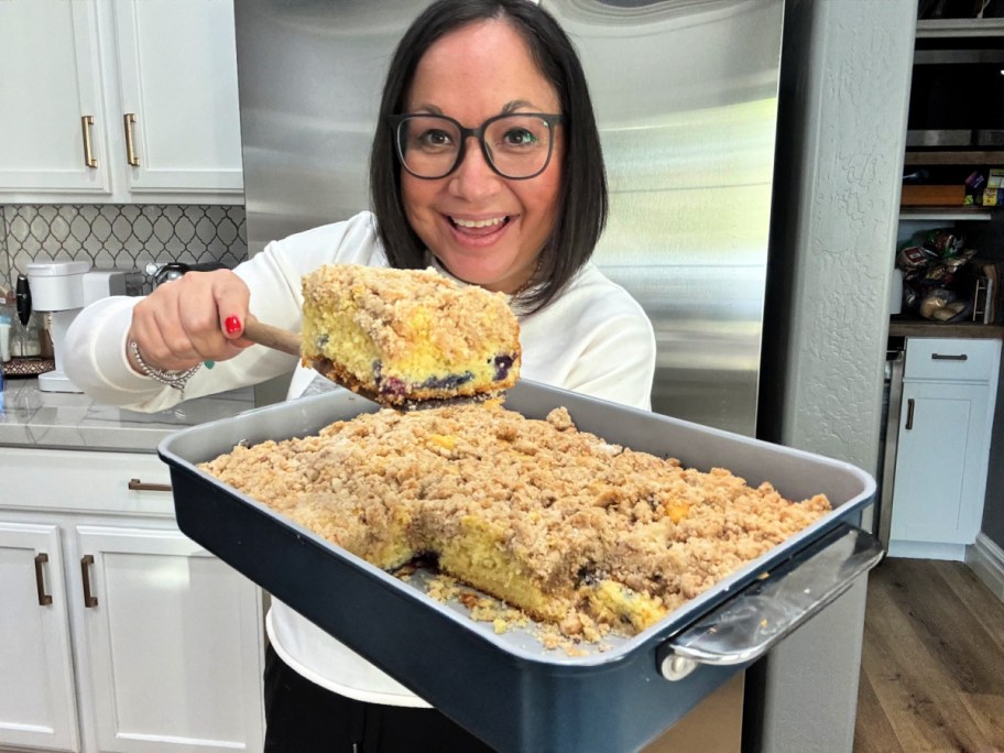 woman holding coffee cake