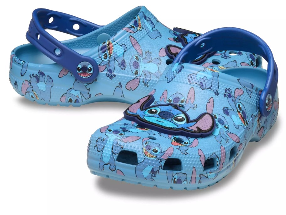 a pair of Stitch Crocs clogs