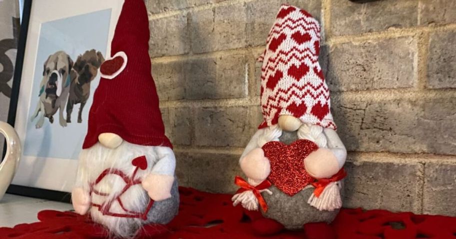 Two Valentines Day holiday gnomes on a mantel