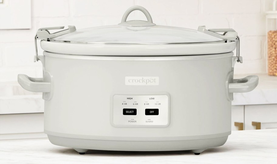 large white crockpot on kitchen counter