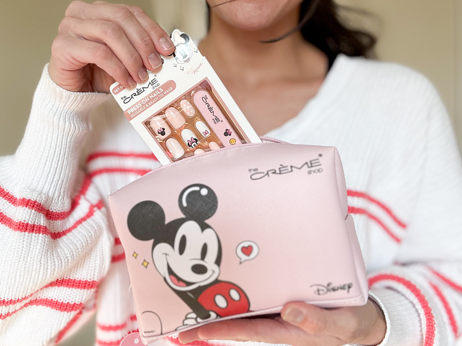 Disney Mickey & Minnie Belong Together Bundle being held by woman