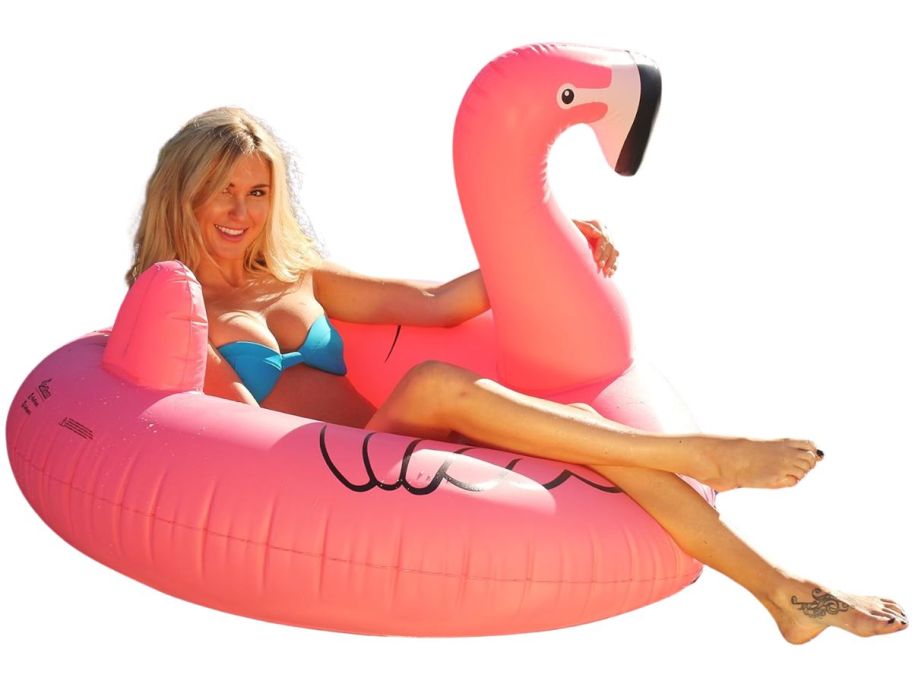 woman on pink flamingo inflatable float