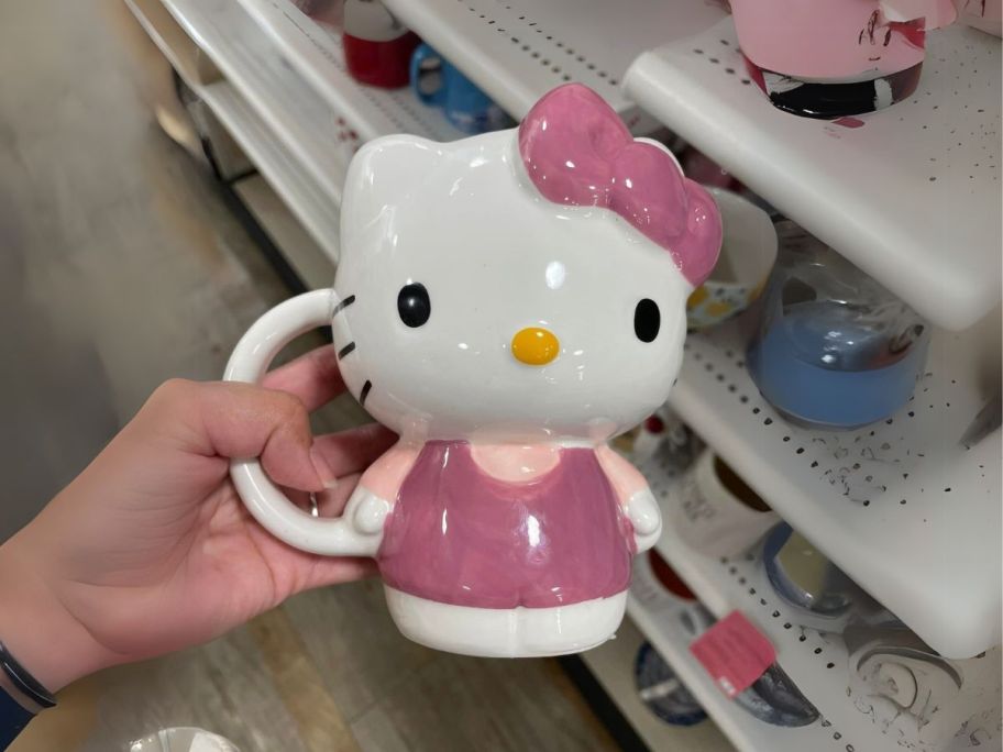 Hello Kitty Ceramic 3D Sculpted Mug in hand in store