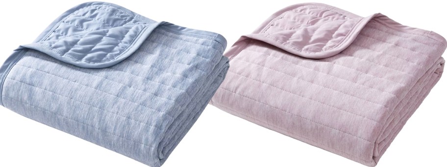 blue and pink folded throw blankets