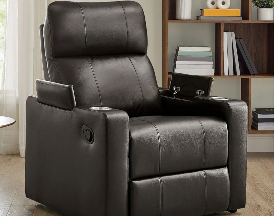 A mainstays faux leather recliner in a living room