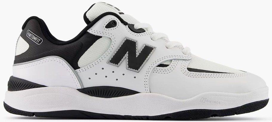 white and black new balance sneaker