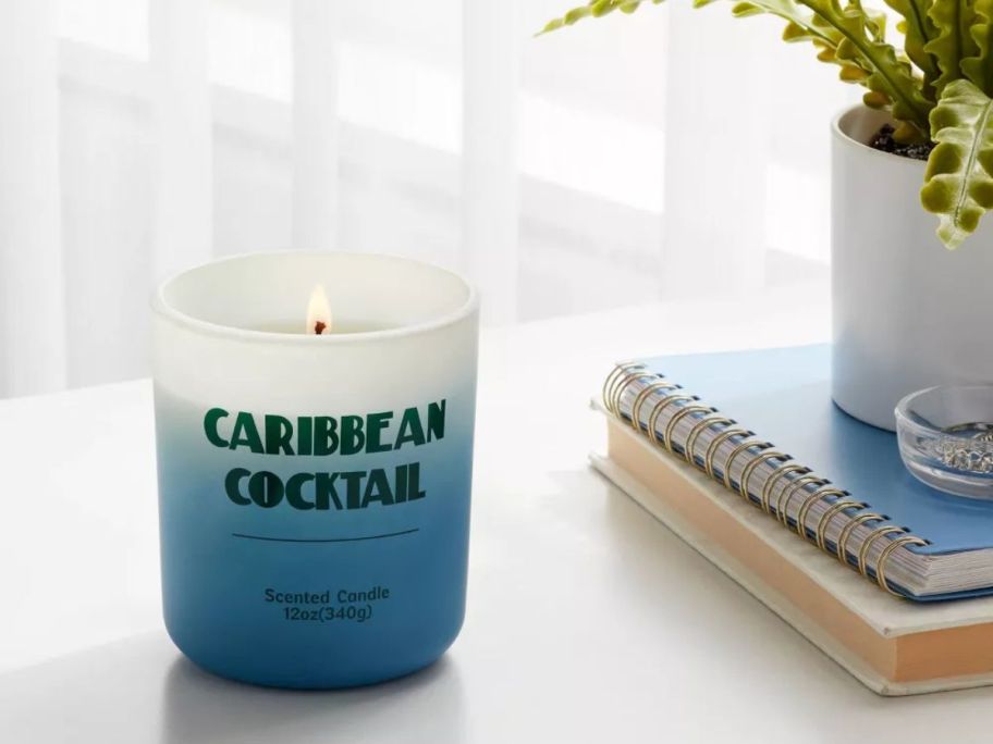 Room Essentials 12oz Frosted Ombre Jar Candle - Caribbean Cocktail on table