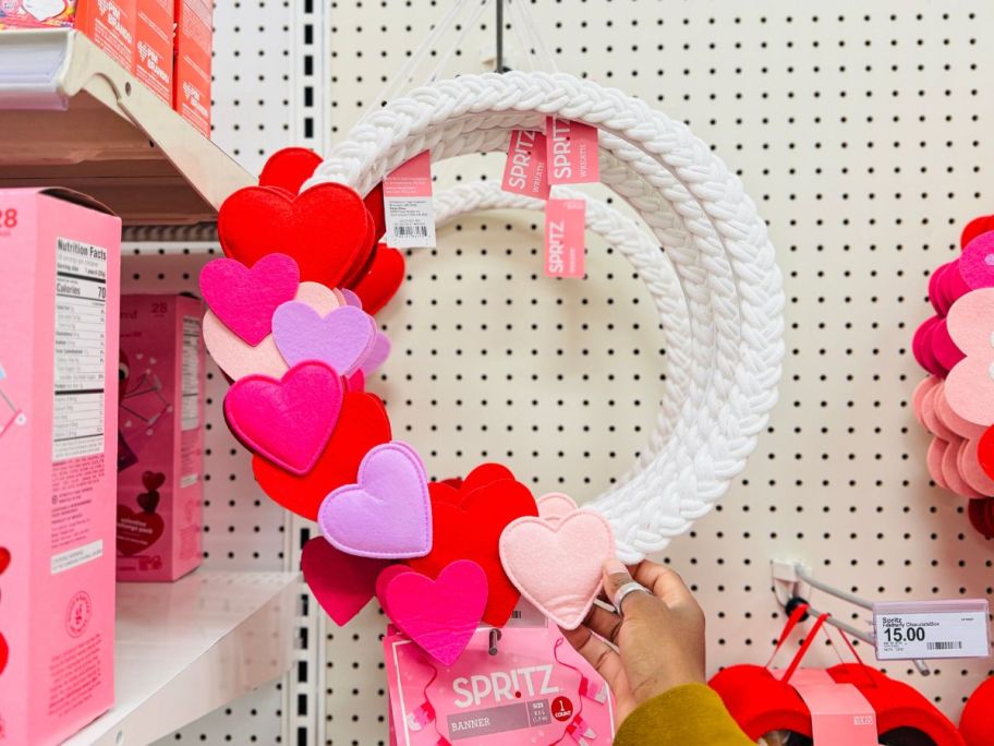 Spritz Wrapped Heart Valentine's Day Yarn Wreath in hand in store