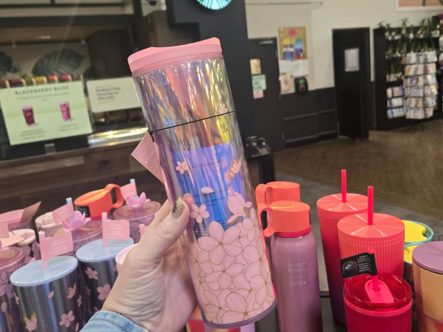 Starbucks Cherry Blossom Tumbler in hand in store