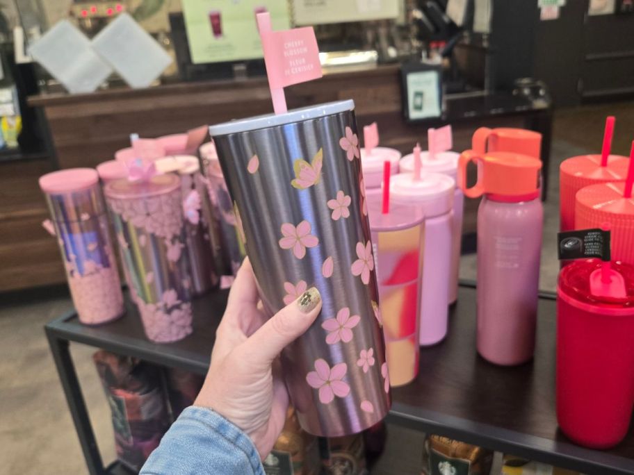 Starbucks Cherry Blossom Tumbler in hand in store