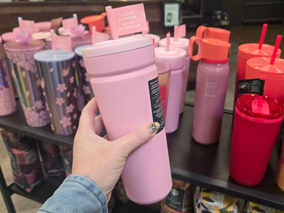 Starbucks Cherry Blossom Tumbler in hand in store