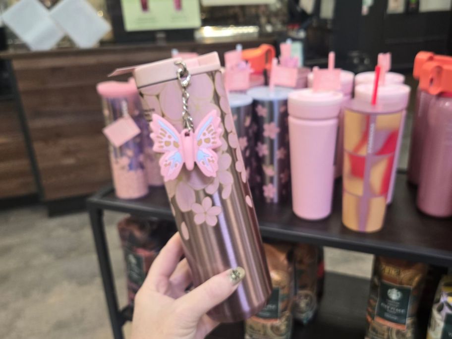 Starbucks Cherry Blossom Tumbler in hand in store