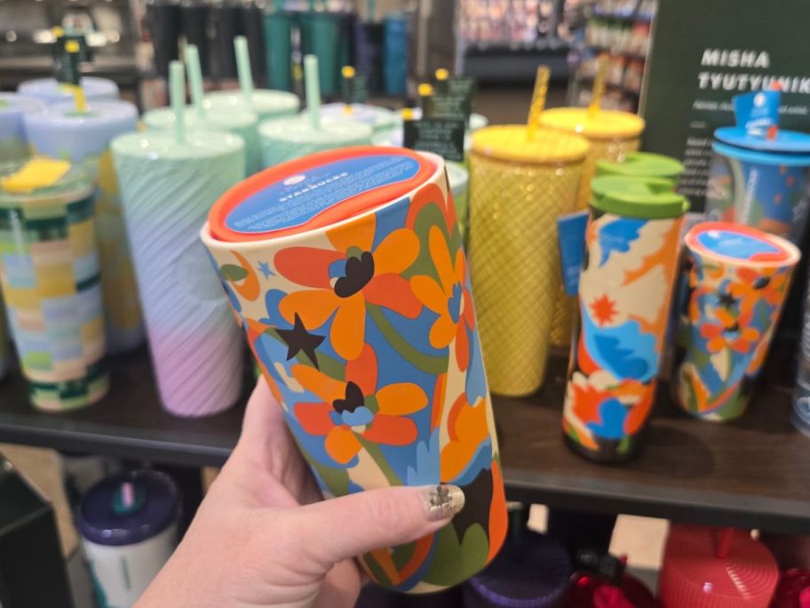 Starbucks Multi-Color Mug Tumbler in hand in store