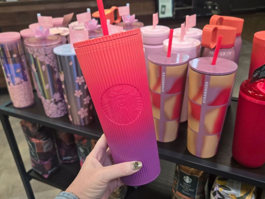 Starbucks Sunset Pleated 24oz Cold Cup in hand in store