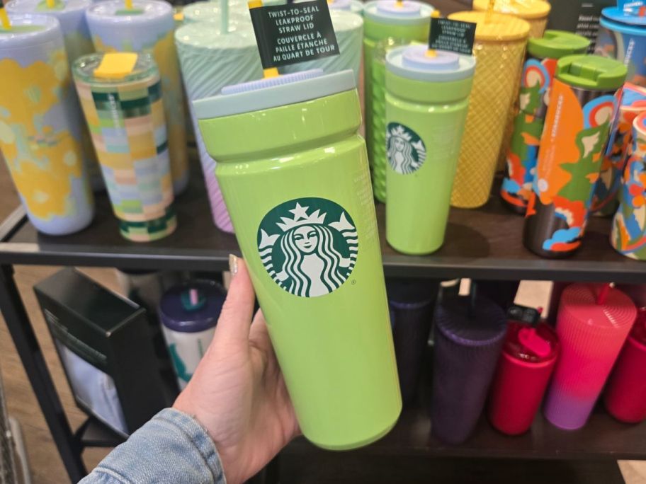 Starbucks Twist-To-Seal Leakproof Straw Lid Tumbler in hand in store