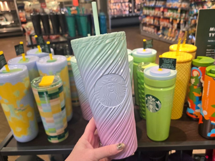 Starbucks Pastel Swirl 24oz Cold Cup in hand in store