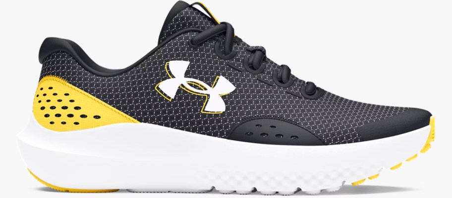 black and yellow under armour running shoe