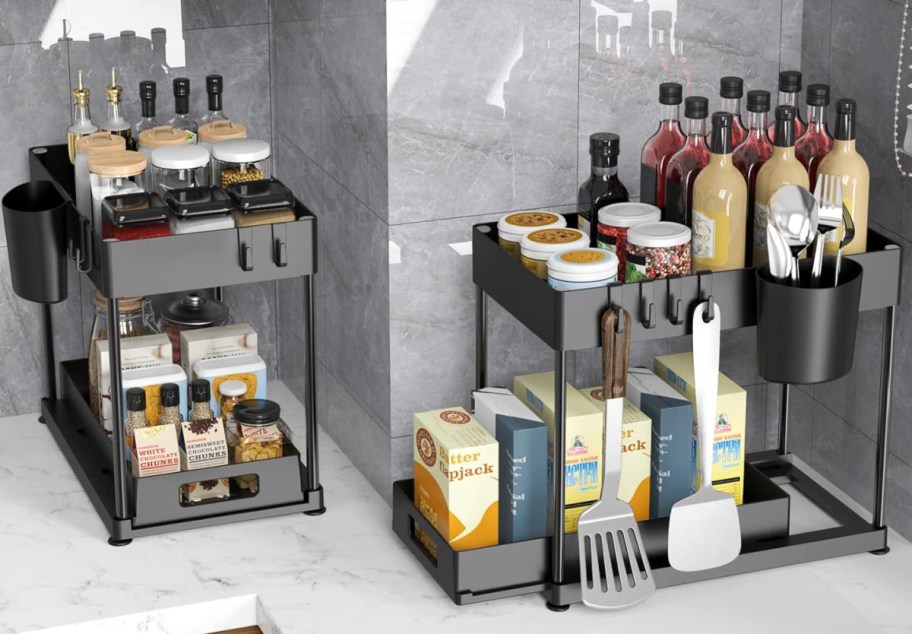 under the sink organizers displayed on the side of a counter with items on it