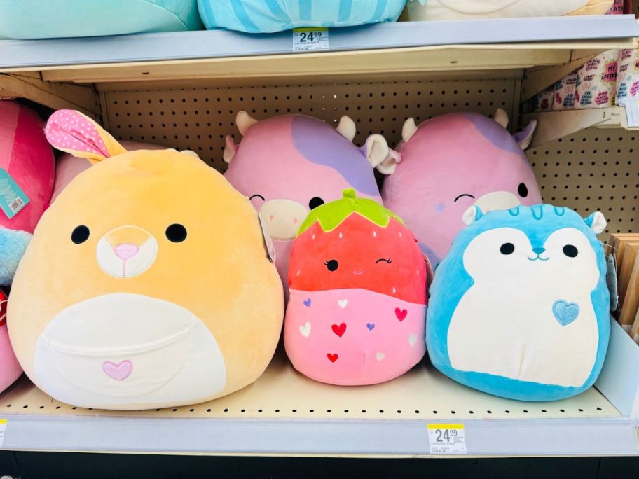 Squishmallow plush toys on a shelf