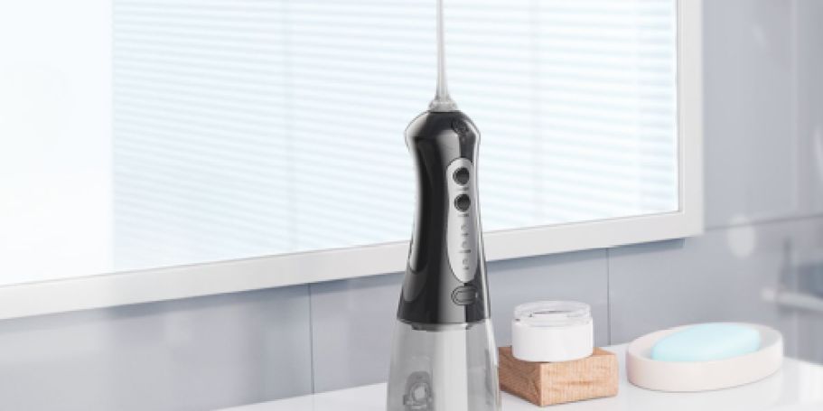 Cordless Water Flosser JUST $9.99 on Amazon | Includes 6 Replacement Heads & Tongue Scraper