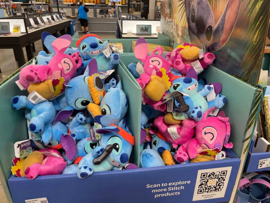 a bin of various Disney Stitch & Angel plushes at Walmart