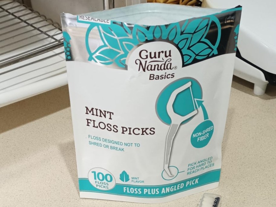 open bag of dental floss picks