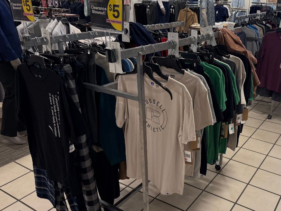 men's tops on rack in store