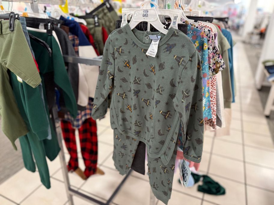 kids pajama sets on rack in store