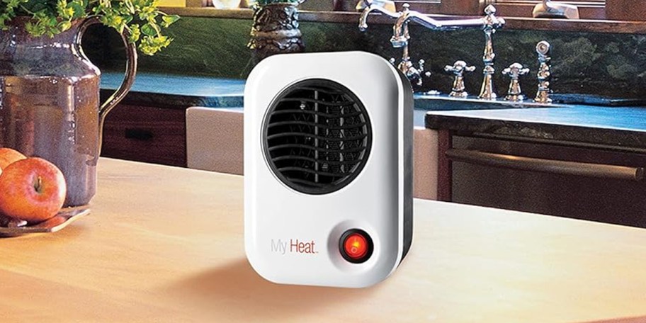 white myheat space heater on table