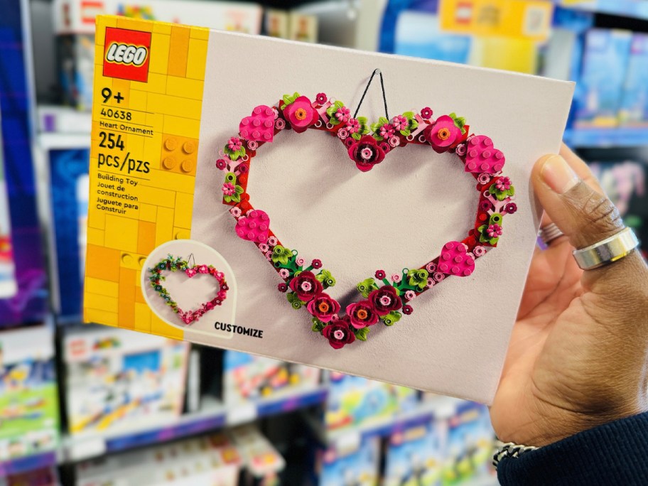 hand holding lego wreath set 