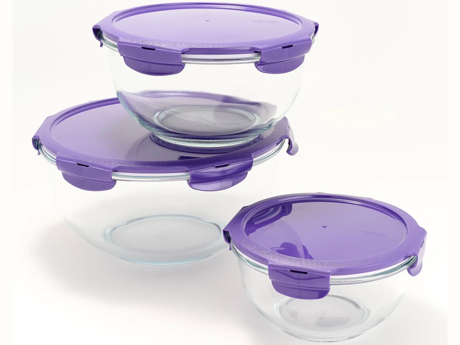 3 glass bowls with purple lids 