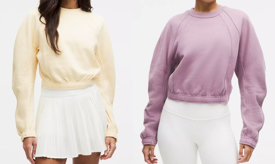 two women in white and purple crewneck sweatshirts