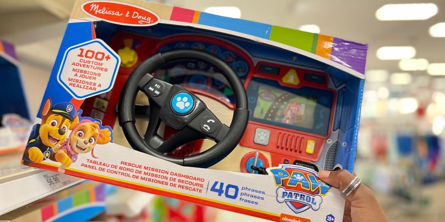 hand holding melissa and doug dashboard 