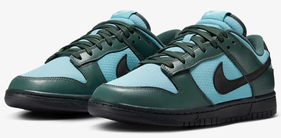 a pair of green and blue men's Nike Dunk sneakers