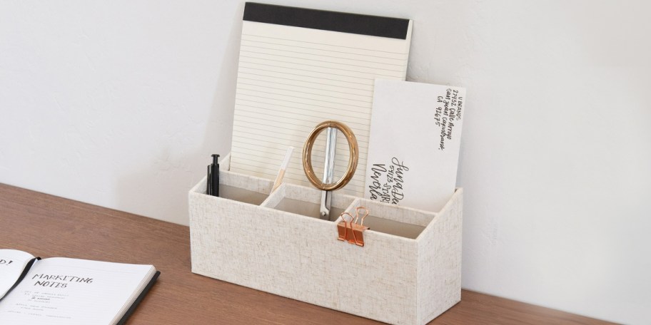 beige linen desk storage box on desk 