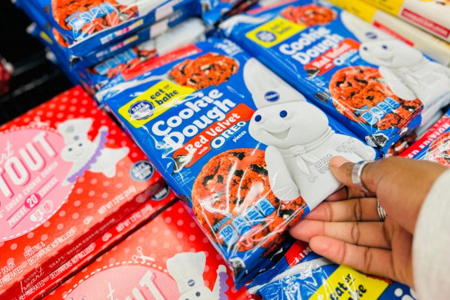 hand grabbing pillsbury oreo cookies