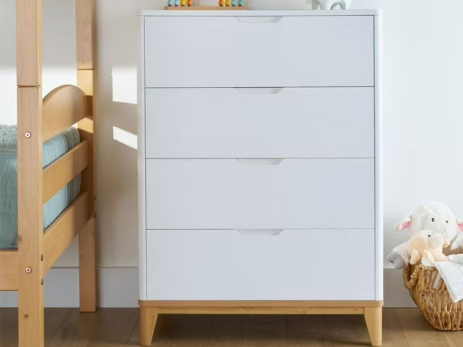 A white 4-drawer dresser 