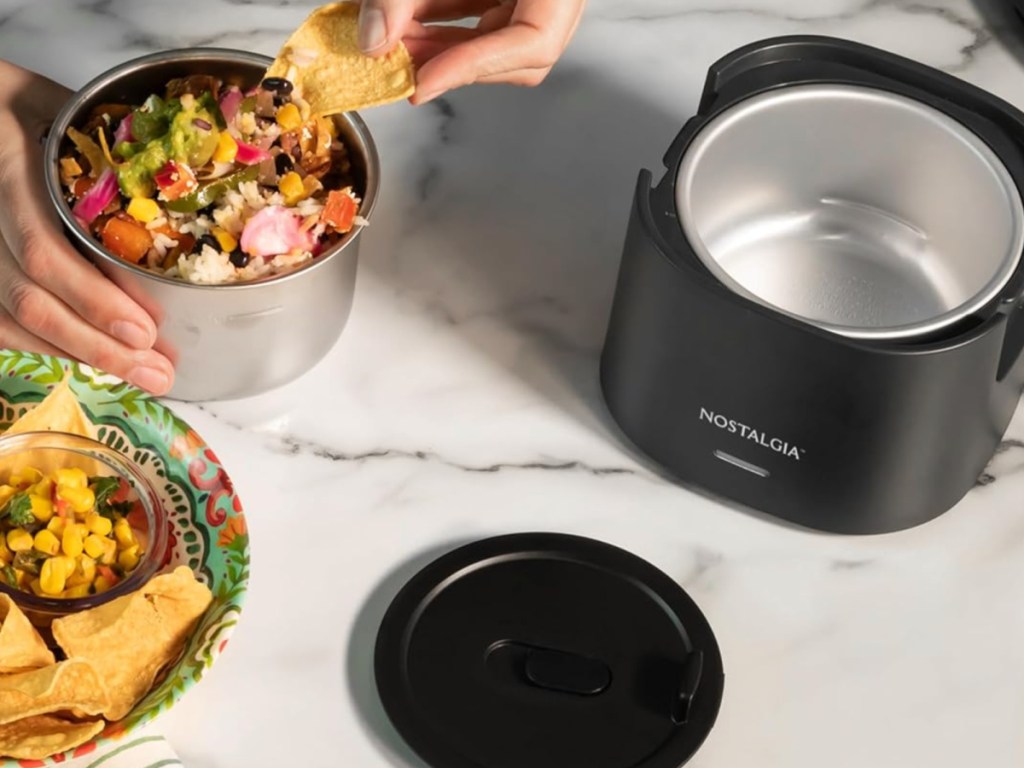 Black nostalgia, portable lunchbox on kitchen countertop