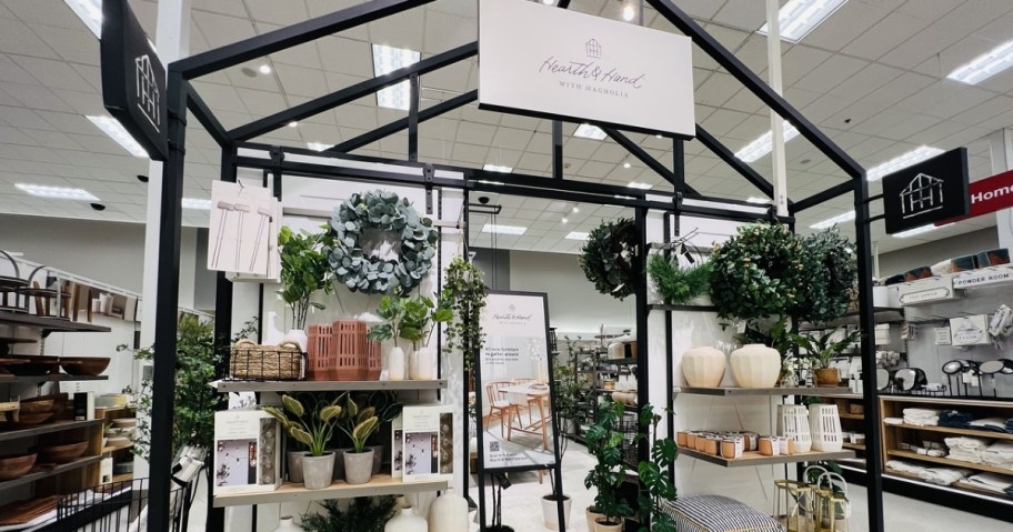 the Hearth and Hand with Magnolia display area in a Target store with various home decor items