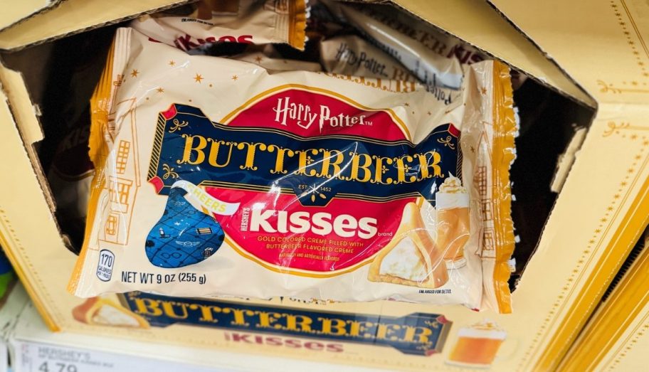 a bag of Hershey's Harry Potter Butterbeer Kisses in a display bin on a store shelf