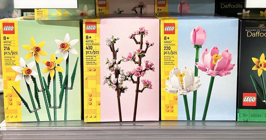 boxes of lego flower sets on store shelf