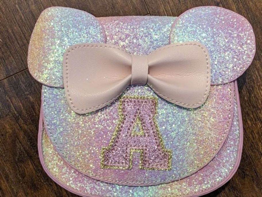 A sparkly Minnie Mouse inspired initial purse 