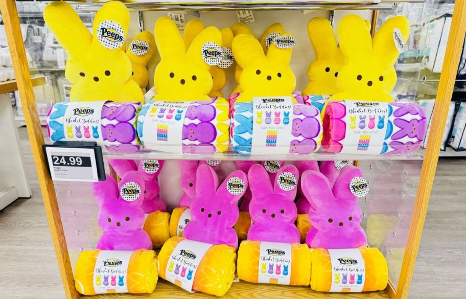 peeps yellow and pink plush and throw sets on display in a kohls store