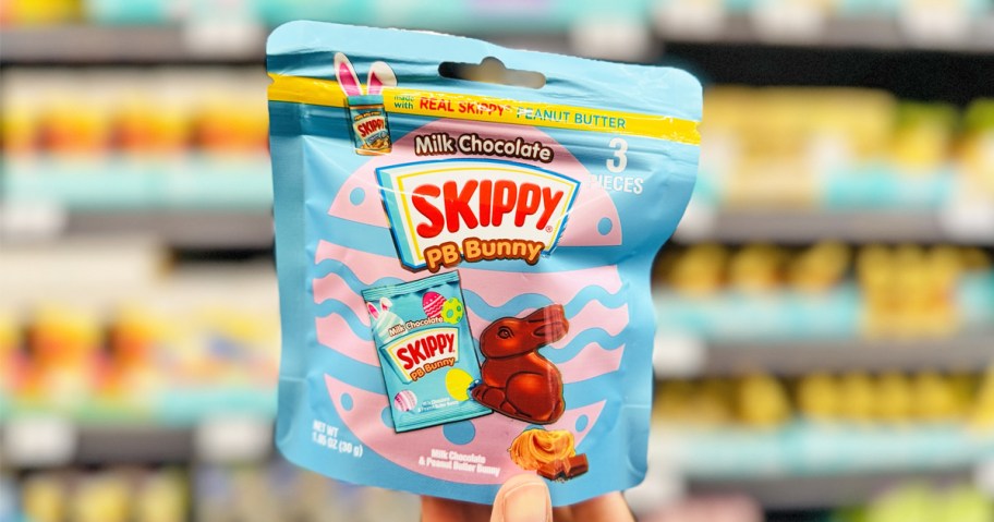 hand holding up SKIPPY Peanut Butter Bunny in store