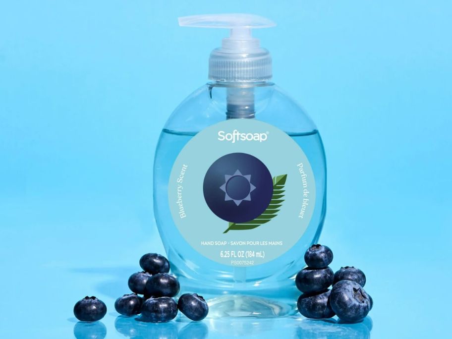 Softsoap Limited Edition Liquid Hand Soap 6.25oz in Blueberry scent surrounded by blueberries