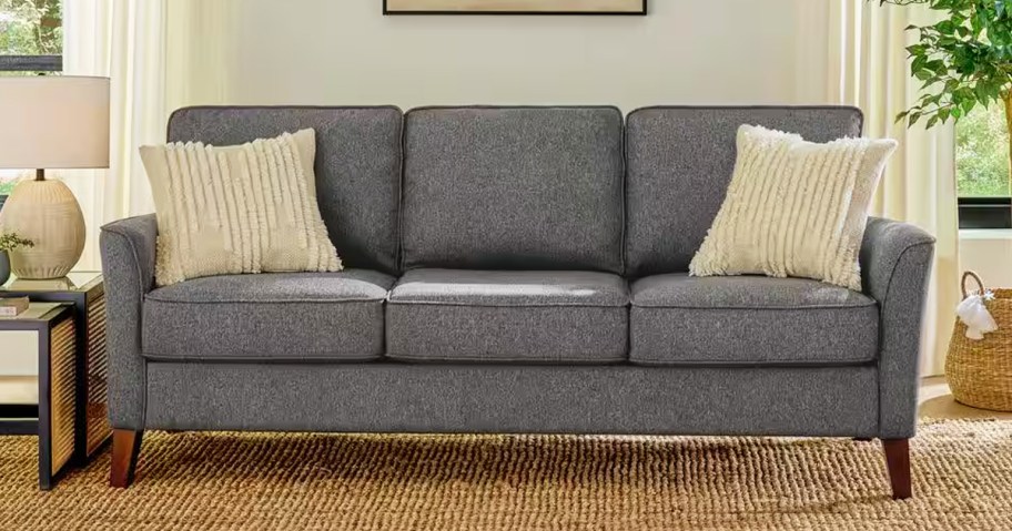 grey upholstered sofa in living room