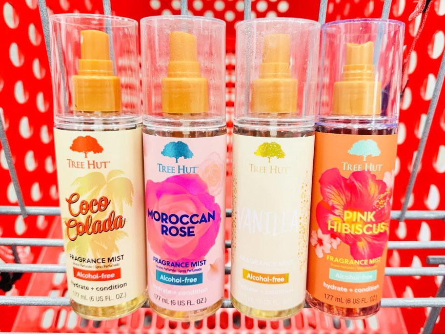 4 bottles of Tree Hut Fragrance Mists in a red shopping cart